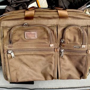 Tumi T-Pass laptop briefcase brown ballistic nylon.  Amazing quality.